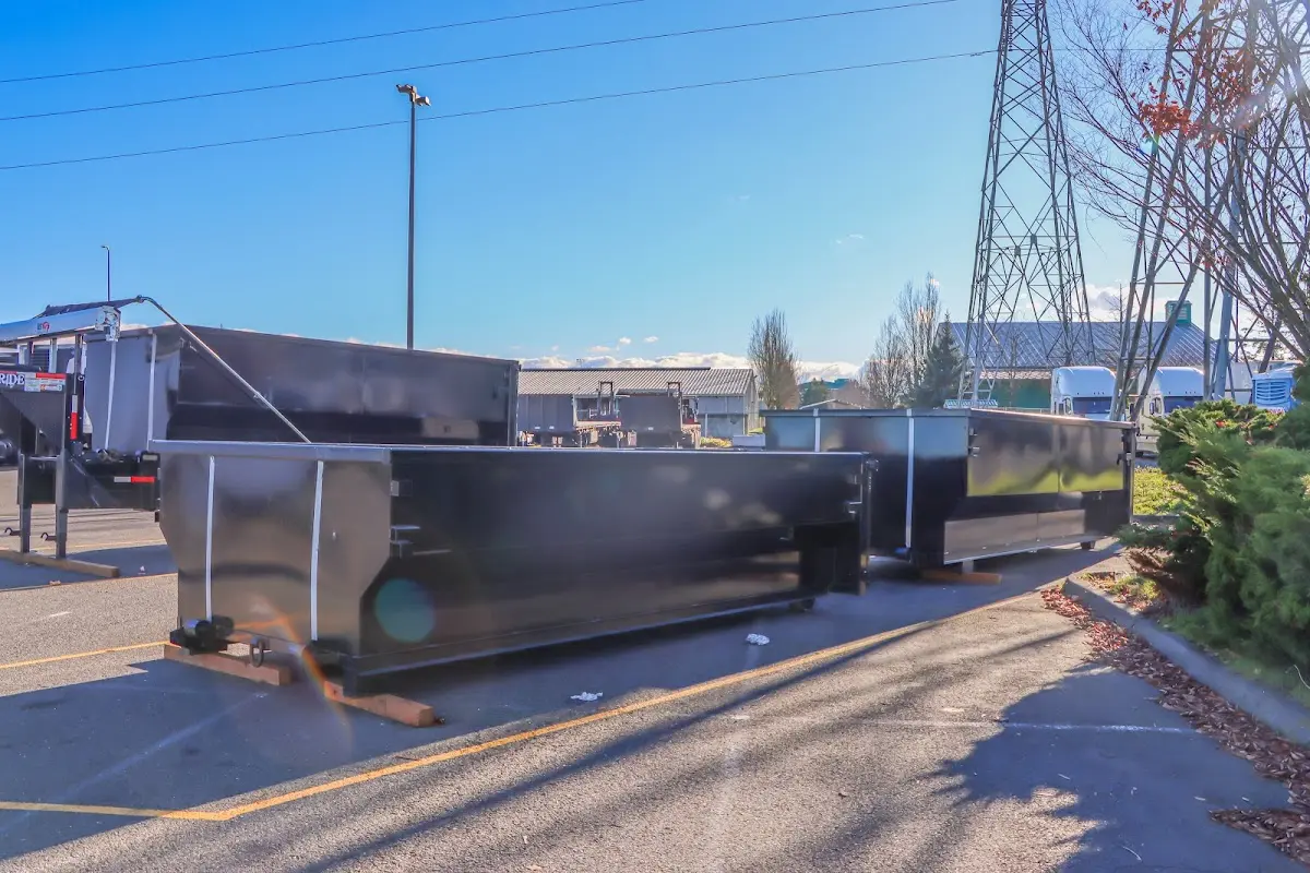 Roll-off dumpster ready for waste disposal at job site for Construction Dumpster Rental in Woodburn